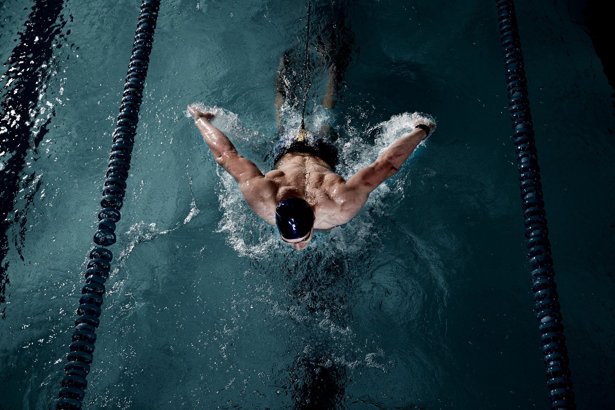 Sportsman Swims in Pool