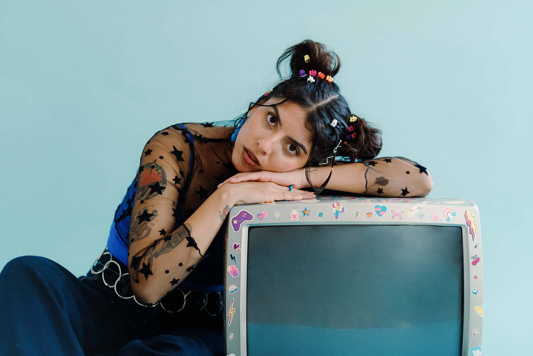 Woman with Disability in Nineties Fashion Leaning on a TV
